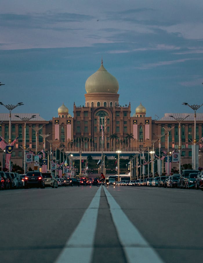 team-01 Dramatic view of Putrajayas iconic landmark at twilight, showcasing beautiful architecture.